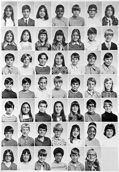 Black and white yearbook portraits of students in Miss Stanton’s class. 48 children are pictured.