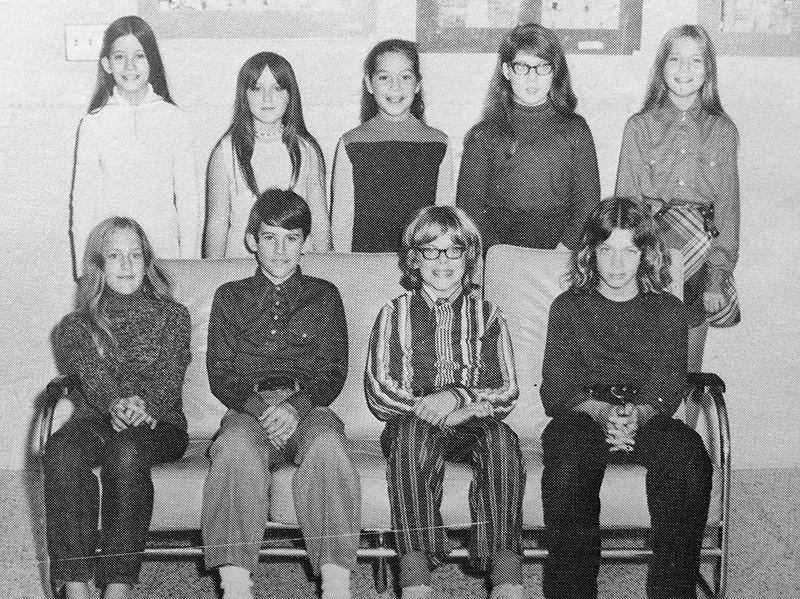 Black and white yearbook photograph of Lake Anne's SCA. Nine students are pictured, six girls and three boys. 