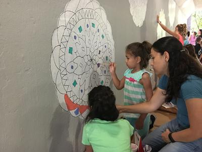 The mural project brought students together before the start of the school year.